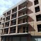 Edifici a mig construir al carrer Bergueda 21. Eix