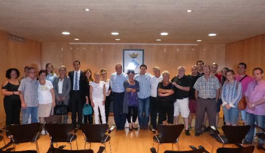 Ajuntament de Calafell. Reunió dels paradistes del mercat, Mercadona i lAjuntament de Calafell