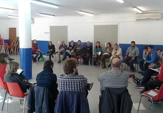 Eix. Imatge de l'assemblea oberta 