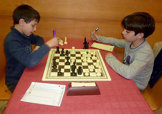 S. Sedó. Dos dels participants en plena partida descacs 