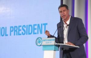 Xavier García Albiol, intervenint a l'acte d'inici de campanya del PPC, amb el rètol de 'president' darrere. ACN