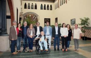 Foto de família al departament de Salut amb el conseller Comín i representants de les entitats de la Taula del Tercer Sector. ACN