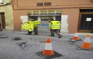 Operaris treballant a les 10:25 del matí