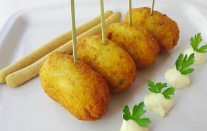 Croquetes . Eix