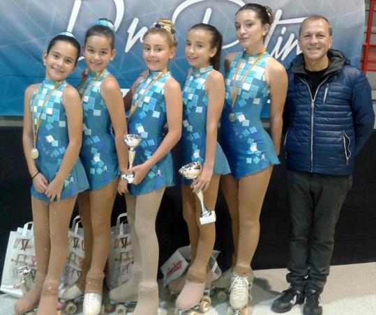 Les patinadores del Club Patinatge Artístic Sitges . Eix