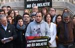 L'exdiputat cupaire David Fernández intervenint a l'acte unitari sota el lema 'L'autodeterminació no és delicte' al Palau Robert. ACN