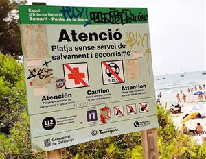 Cartell d'informació de la platja de Tarragona. Eix