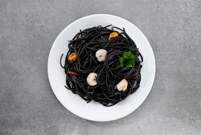 Espaguetis negres "frutti di mare". AMIC - Getty Images