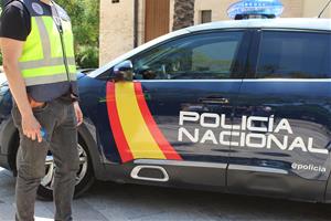 Cotxe de la policia nacional. Eix