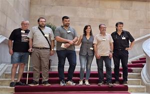 Els representants de les entitats al Palau de la Generalitat. Eix