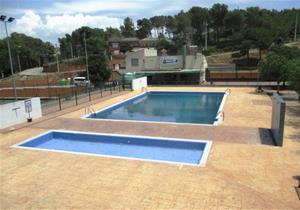 Piscina de Daltmar. Eix