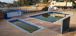 Piscina i zona esportiva de Daltmar.. Eix