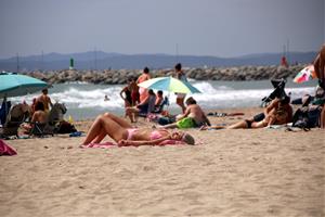 Catalunya tanca l'estiu turístic amb satisfacció al sector i l'eclipsi solar i la calor com a protagonistes