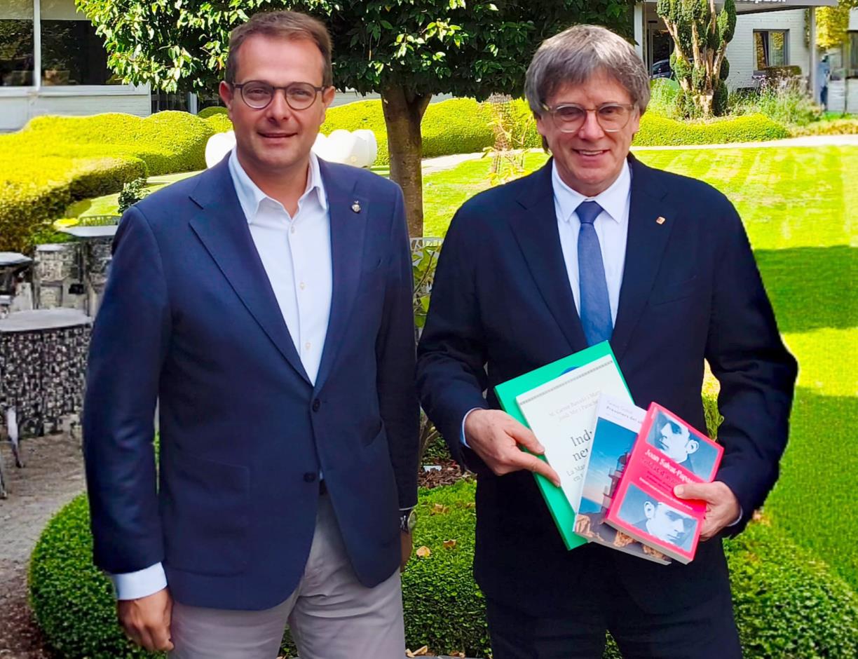Gerard Figueras i Carles Puigdemont. Eix